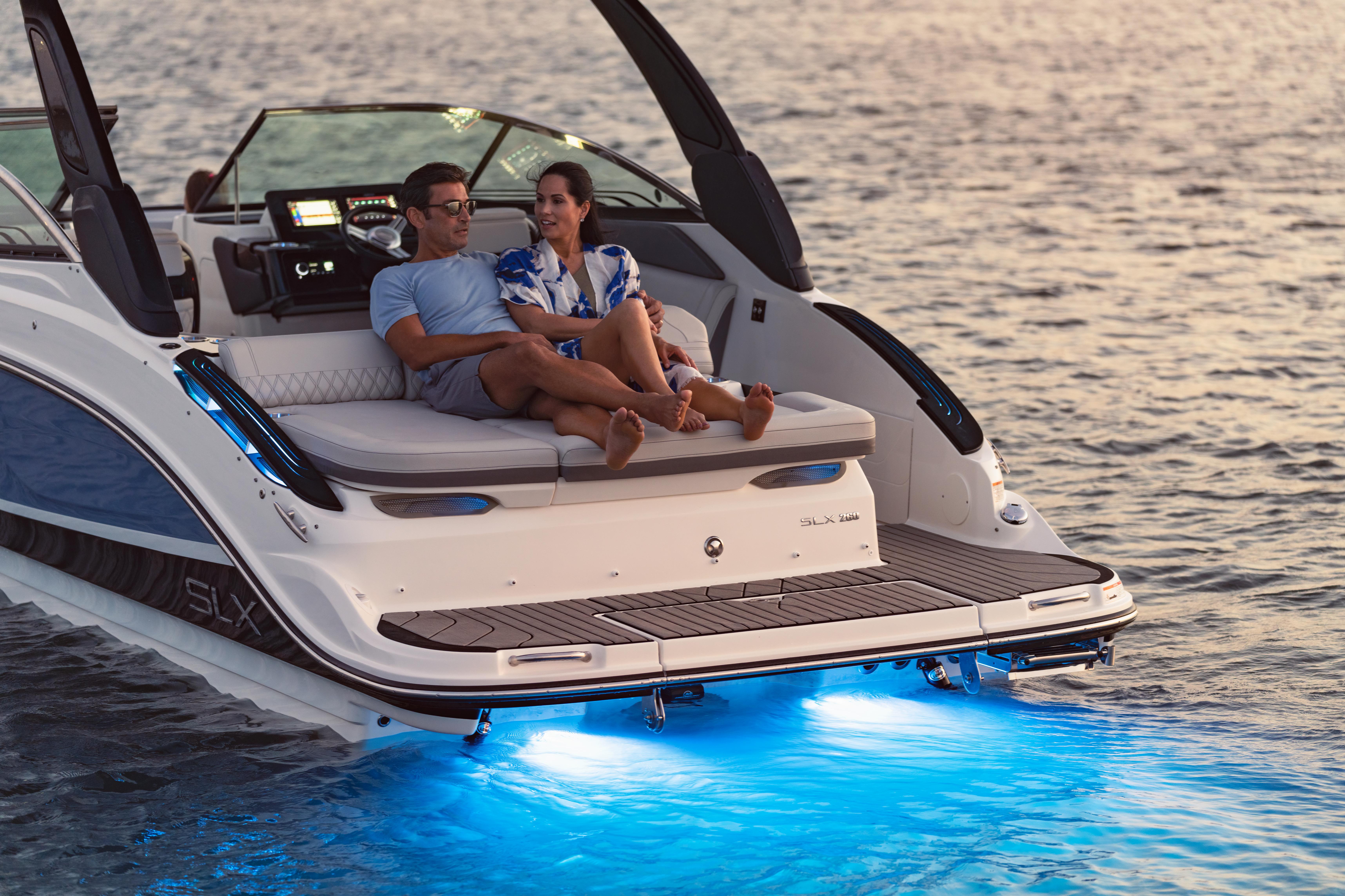 2023 Slx 260 Slx260 Lifestyle Couple Transom Sunpad Underwater Accent Lighting 04054 Select