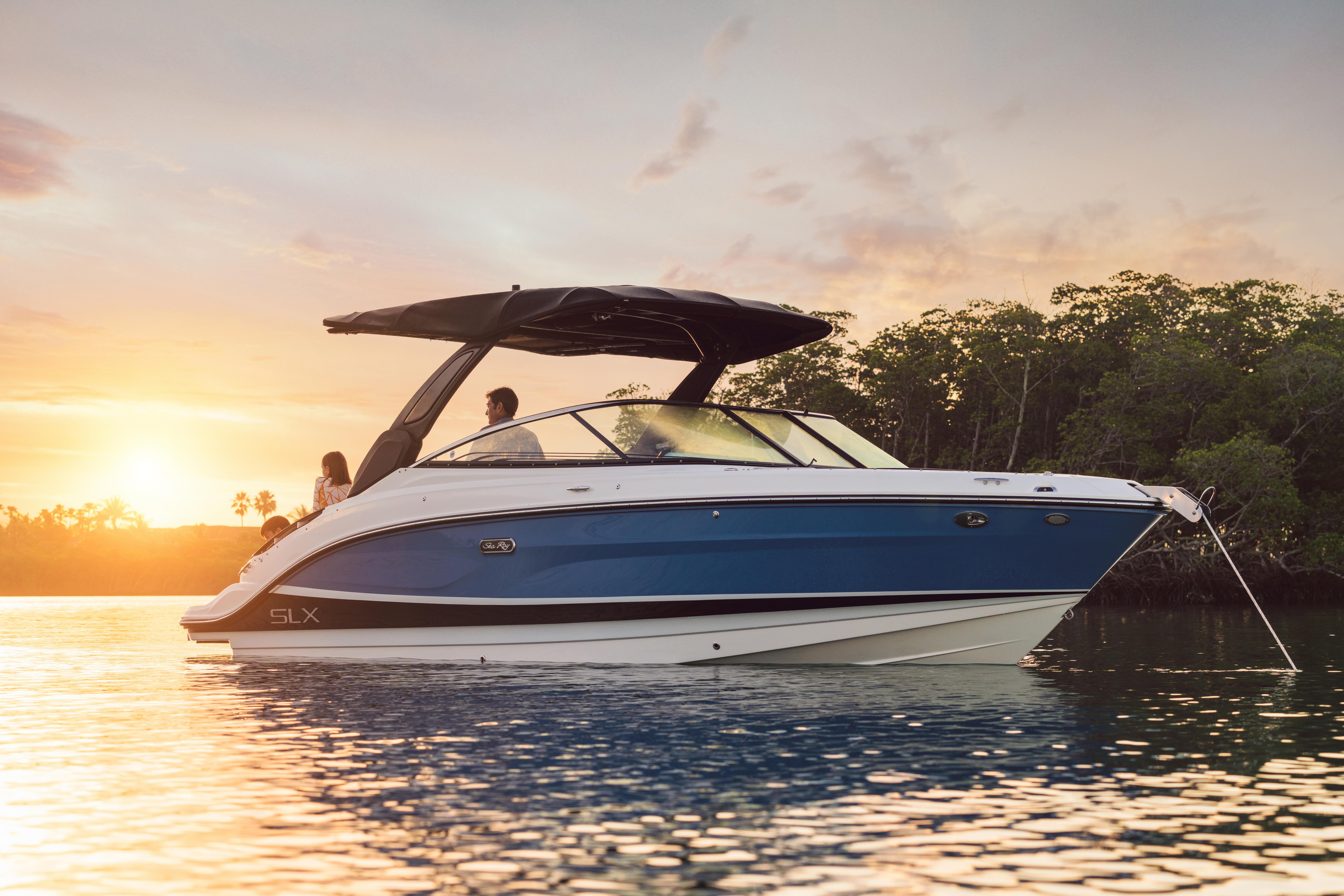 2023 Slx 260 Slx260 Lifestyle Starboard Bow Three Quarter Family Sunset 02620 Select